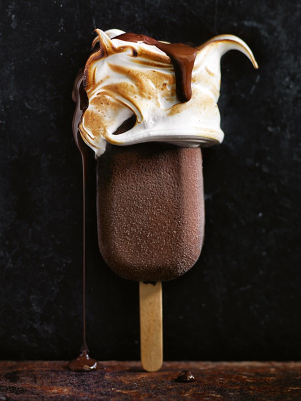 Chocolate ice-creams with torched meringue and chocolate sauce
