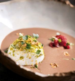 Chocolate île flotante with Sicilian pistachios and hazelnuts