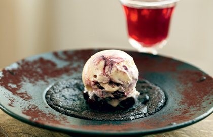 Chocolate, juniper and sloe gin pudding with damson ripple ice cream
