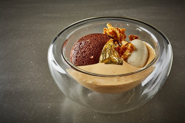  Chocolate moelleux with caramel foam and cardamom ice cream