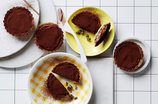 Chocolate mousse and pistachio and orange tartlets