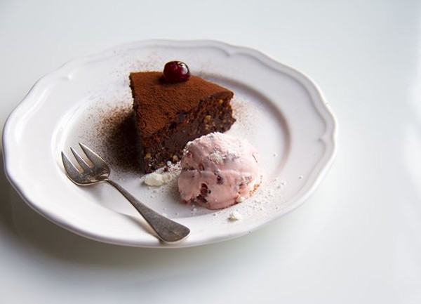 Chocolate nut torte with cherry meringue ice cream