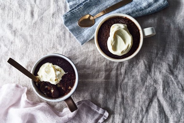Chocolate olive oil mug cake with sumac and white chocolate chunks