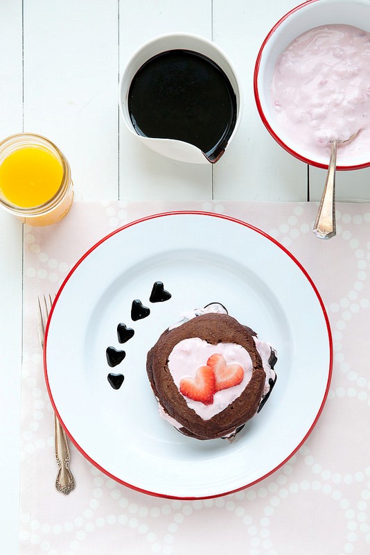 Chocolate pancakes with strawberry yogurt