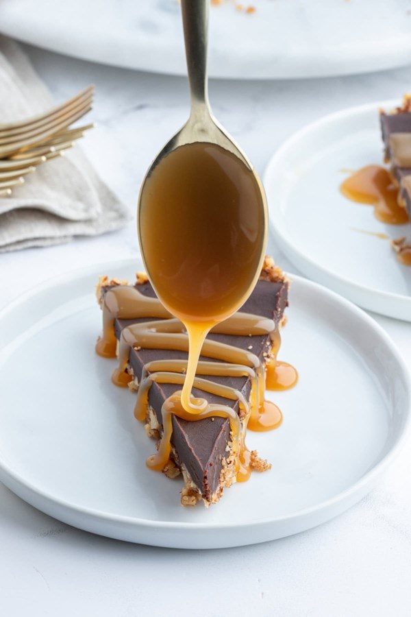 Chocolate pecan tart with caramel sauce