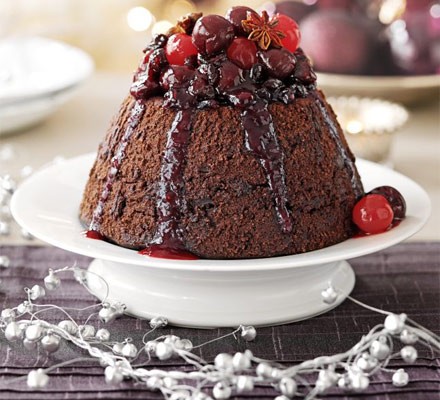 Chocolate pudding with spiced berry syrup