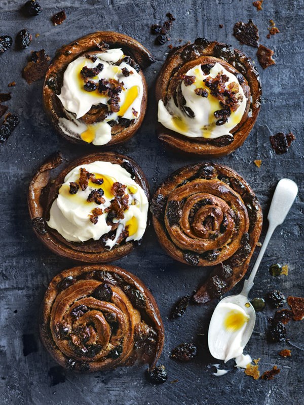 Chocolate rum and raisin scrolls with cream cheese icing