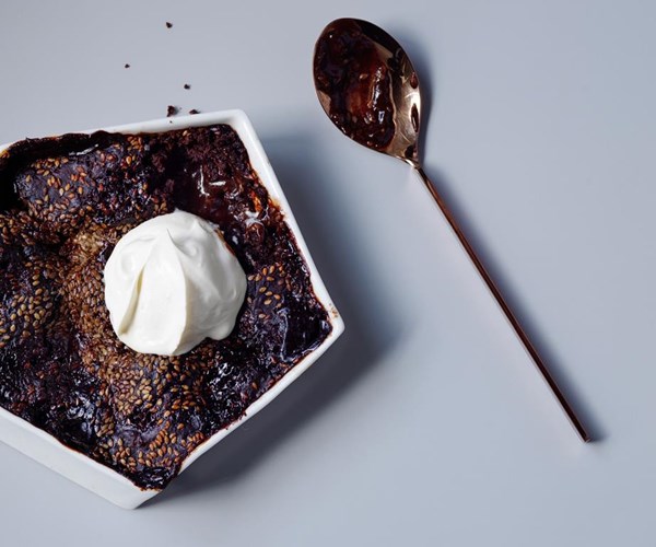 Chocolate self-saucing pudding with sesame crunch