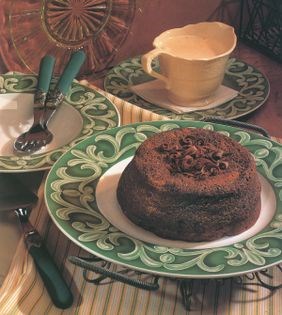 Chocolate soufflé with crème de menthe sauce