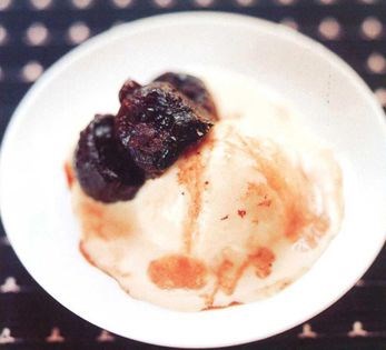 Chocolate-stuffed prunes with Calvados and ice cream