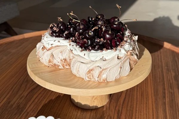 Chocolate swirl Pavlova with cherries & cream