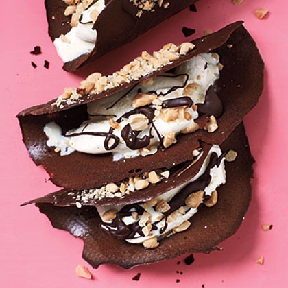 Chocolate tacos with ice cream and peanuts