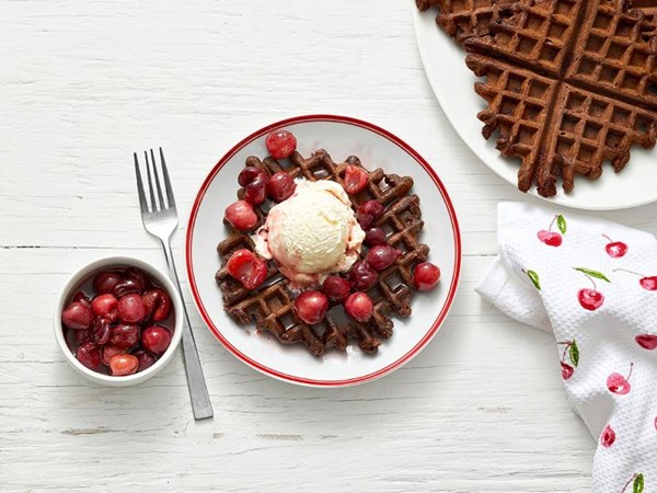 Chocolate waffle sundaes with flambéed cherries 