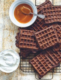 Chocolate waffles with whipped cream and Guinness-caramel sauce