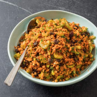 Chopped carrot salad with celery and raisins