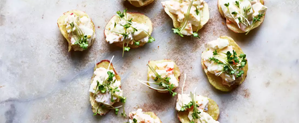 Chopped egg salad on salt and vinegar crisps