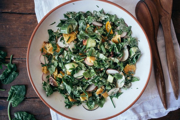 Chopped spinach fattoush salad with tahini-sumac sauce