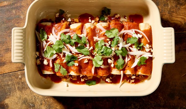 Chorizo and potato enchiladas with salsa roja