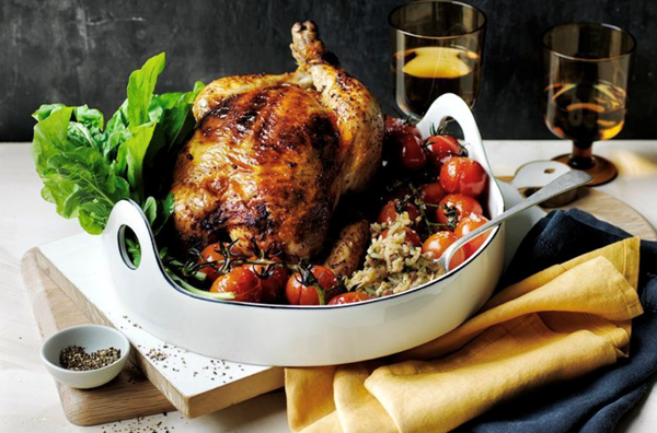 Chorizo and rice stuffed roast chicken with Pedro Ximénez roasted tomatoes