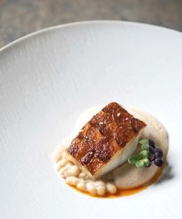 Chorizo-crusted cod with white bean puree
