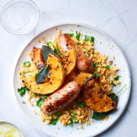 Chorizo sausages with roasted squash and herby couscous