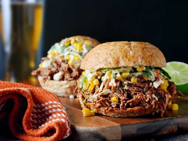 Chorizo-spiced pulled pork with Mexican street corn slaw