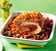 Chorizo-stuffed pork loin with braised beans