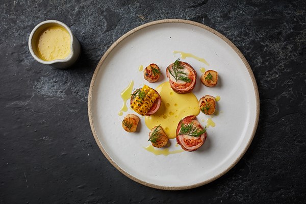 Chorizo-stuffed rabbit saddle with scallops and chilled sweetcorn sauce