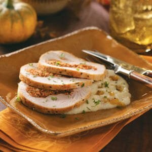 Chorizo-stuffed turkey breast with Mexican grits