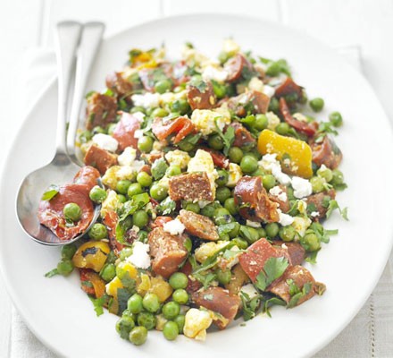 Chorizo with peppers, peas and feta