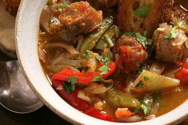 Chorizo with sweet pepper and onion stew and fried croutons