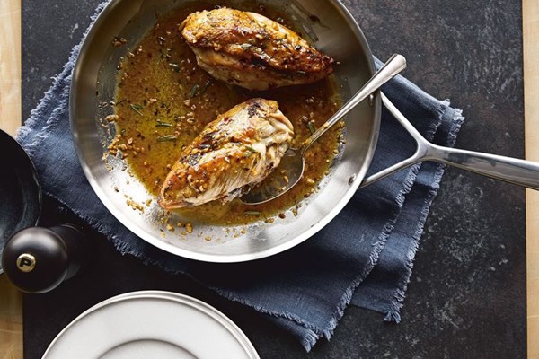Chrissy Teigen's crispy-skinned chicken with lemon-rosemary pan sauce