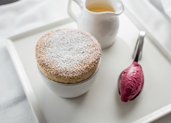 Christmas pudding soufflé, cranberry sorbet, brandy Anglaise