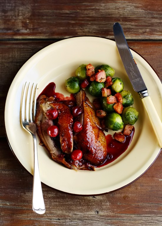 Christmas roast duck with Port and cherry sauce and fried Brussels ...