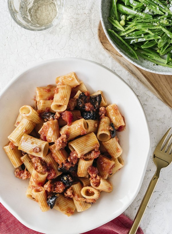Chunky pasta with sausage, olives and tomatoes