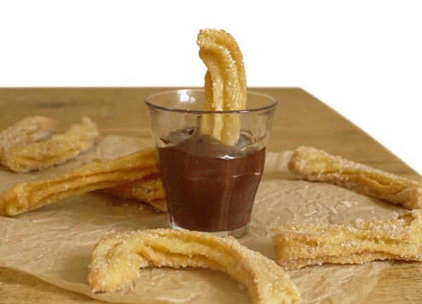 Churros with chocolate orange sauce
