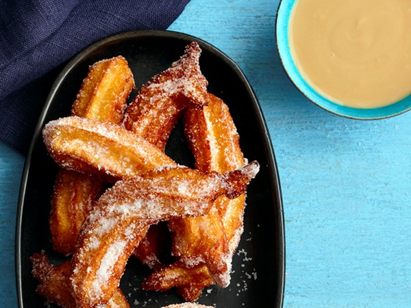 Churros with coconut sauce