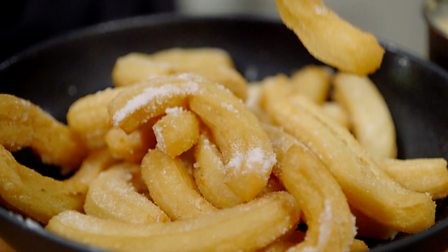 Churros with peaches and custard