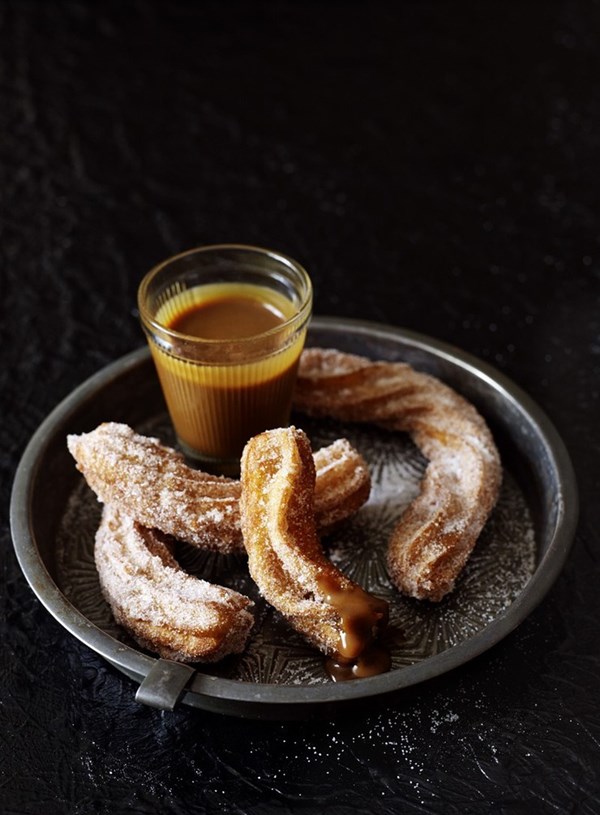 Churros with rum and coconut caramel sauce