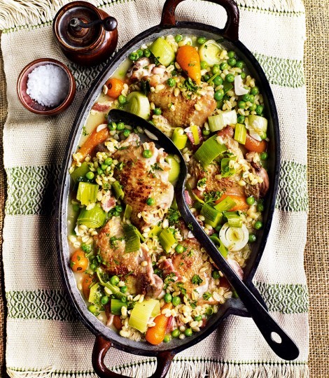 Cider-braised chicken thighs with pearl barley, bacon, carrots and peas