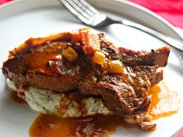 Cider-braised country-style pork ribs with creamy mashed potatoes