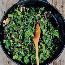 Cider-braised kale with apples and sweet cherries