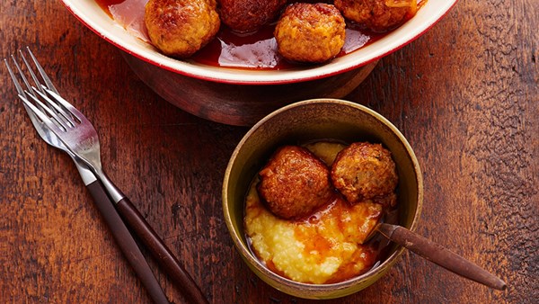 Cider-braised pork meatballs with creamy polenta