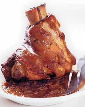 Cider-braised pork shoulder with caramelized onions