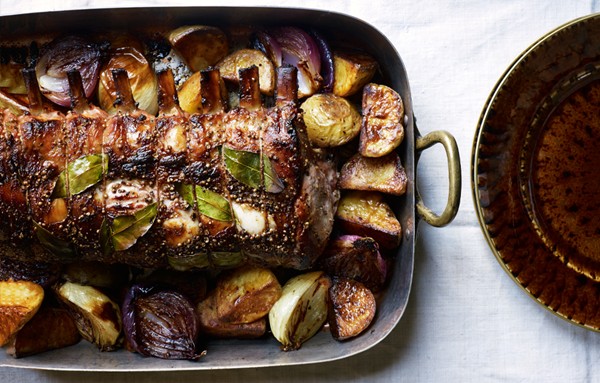 Cider-brined pork roast with potatoes and onions