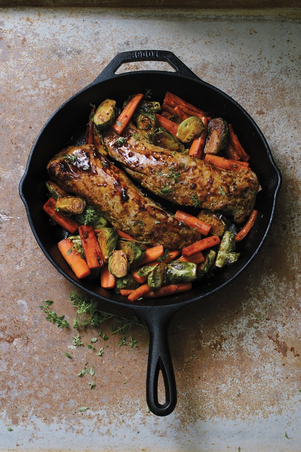 Cider-glazed pork loin with carrots and Brussels sprouts