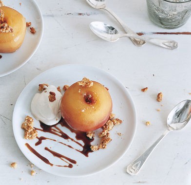 Cider-poached apples with candied walnuts, rum cream, and cider syrup
