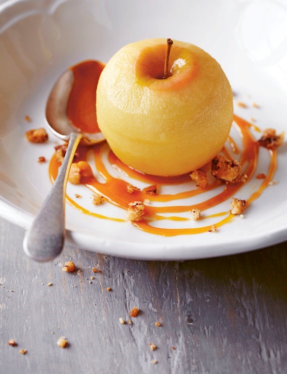 Cider-poached apples with toffee sauce and candied hazelnuts