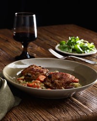 Cider vinegar-braised chicken thighs