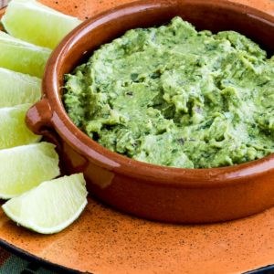 Cilantro-lovers perfect guacamole with red onion, lime, and chiles